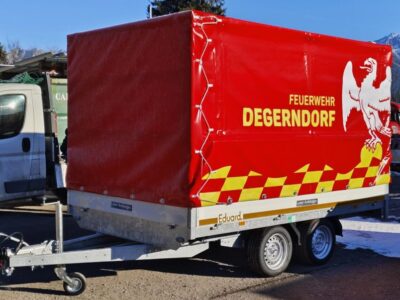 Eduard HL 311 x 200 - 2700kg mit beschriftetem Planenaufbau Laner Anhänger