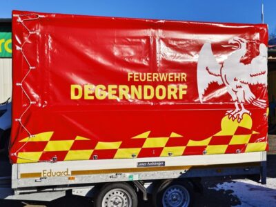 Eduard HL 311 x 200 - 2700kg mit beschriftetem Planenaufbau Laner Anhänger