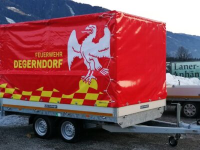 Eduard HL 311 x 200 - 2700kg mit beschriftetem Planenaufbau Laner Anhänger