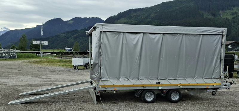 neuwertiger Eduard Hochlader mit grauem Planenaufbau mit Schiebeplane Laner Anhänger